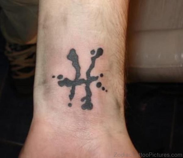 Black Zodiac Tattoo On Wrist 