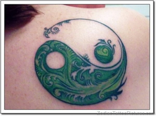 Green Yin Yang Tattoo On Back 