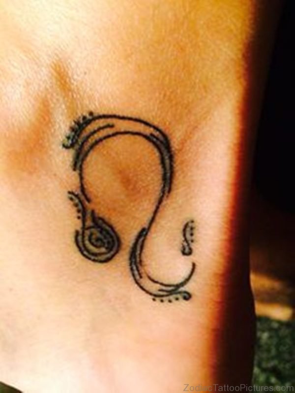 Leo zodiac sign ankle tattoo.