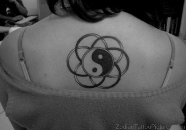 Nice Yin Yang Tattoo On Back 