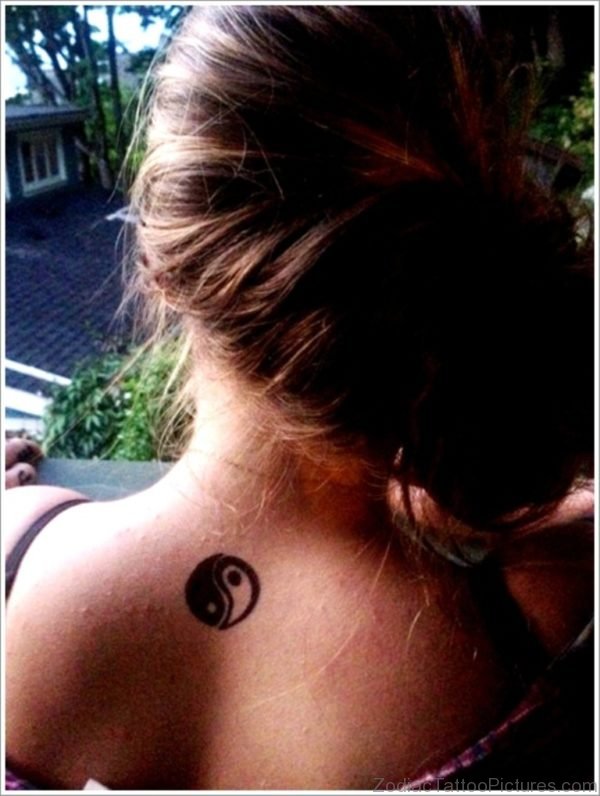 Yin Yang Tattoo On Girl Back 