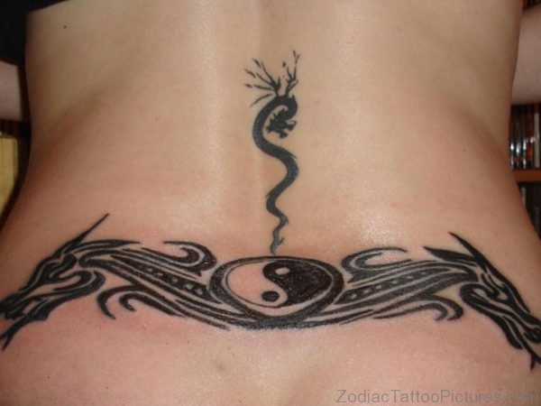 Tribal Yin Yang Tattoo On Lower Back 