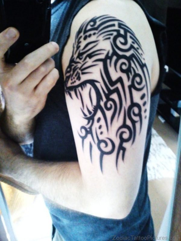 Amazing Black Tribal Leo Tattoo On Arm