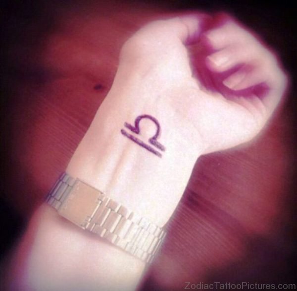 Amazing Libra Tattoo On Wrist 