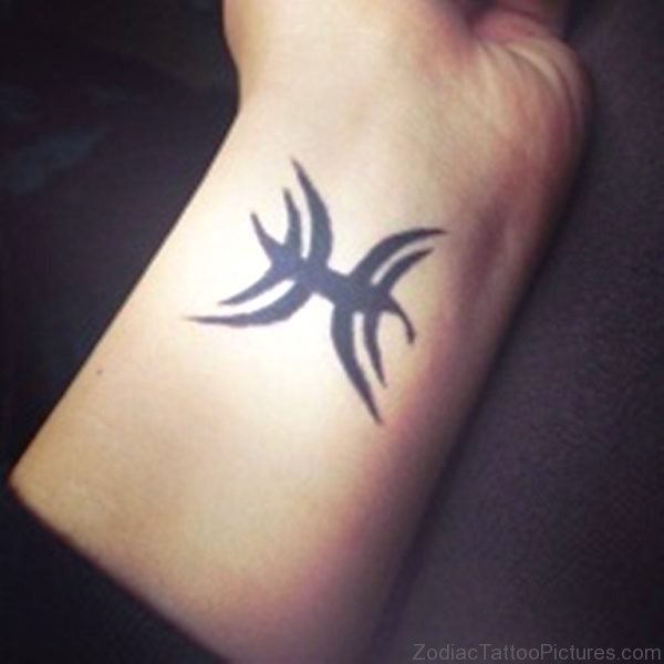 Amazing Pisces Tattoo On Wrist 