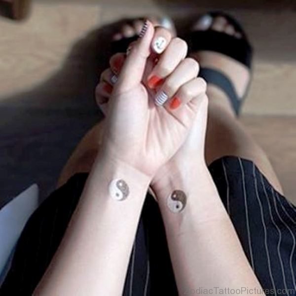 Amazing Yin Yang Tattoo On Wrist 