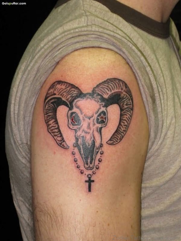 Aries With Rosary Tattoo On Shoulder 