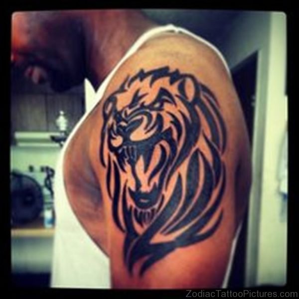 Awesome Tribal Lion Arm Tattoo
