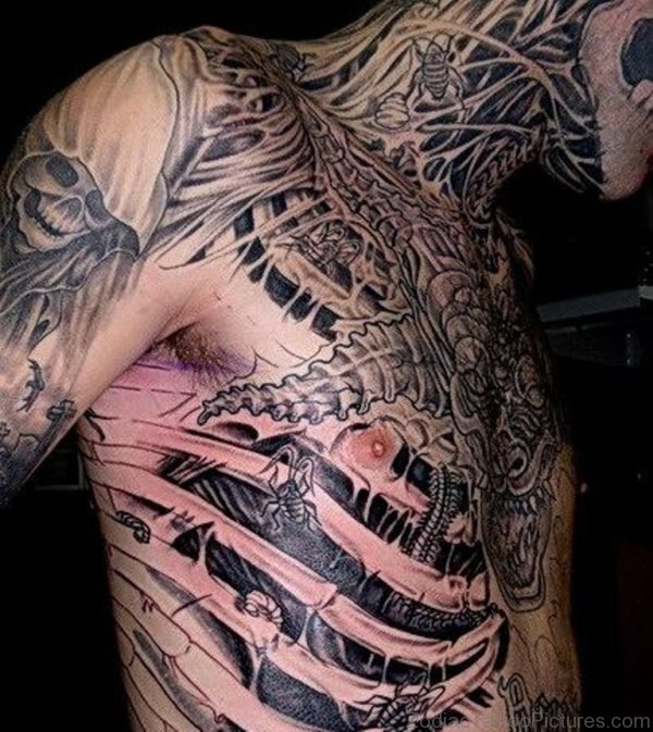 Biomechanical Skeleton Tattoo On Man Chest And Side Rib