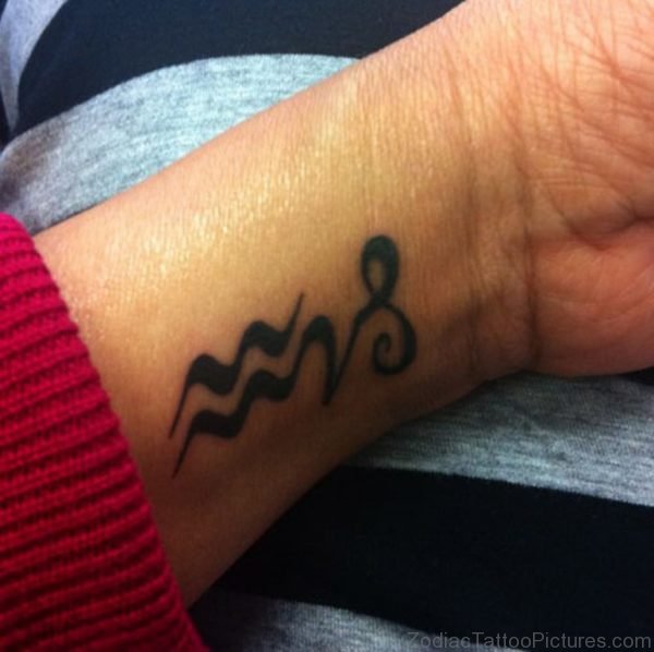 Black Aquarius Tattoo On Wrist
