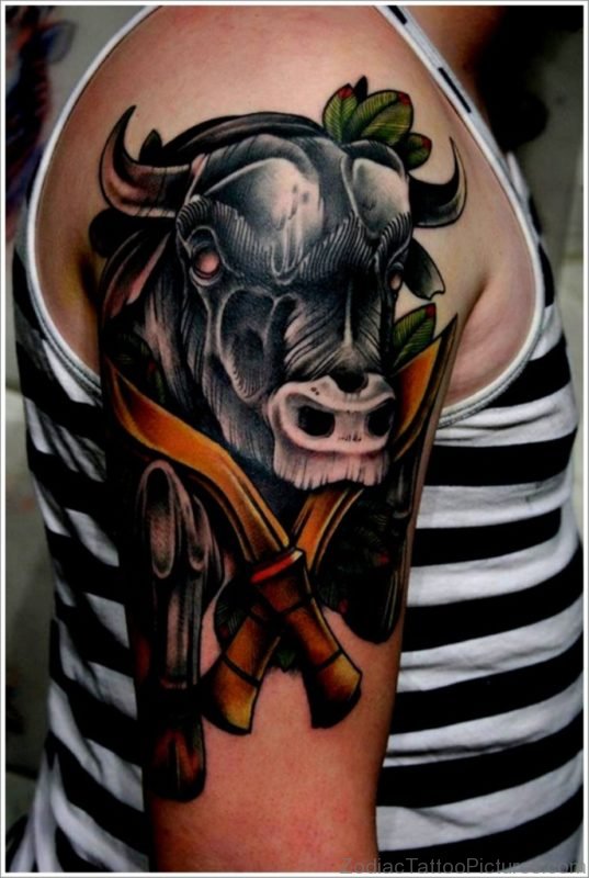 Black Ink Bull And Cross Dagger Tattoo On Men Shoulder