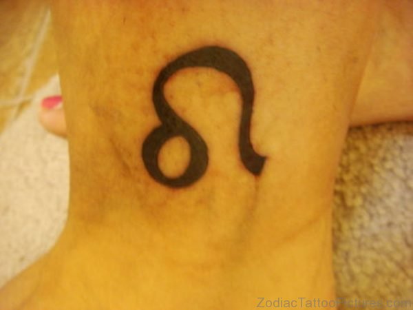 Black Ink Leo Sign Tattoo On Ankle 