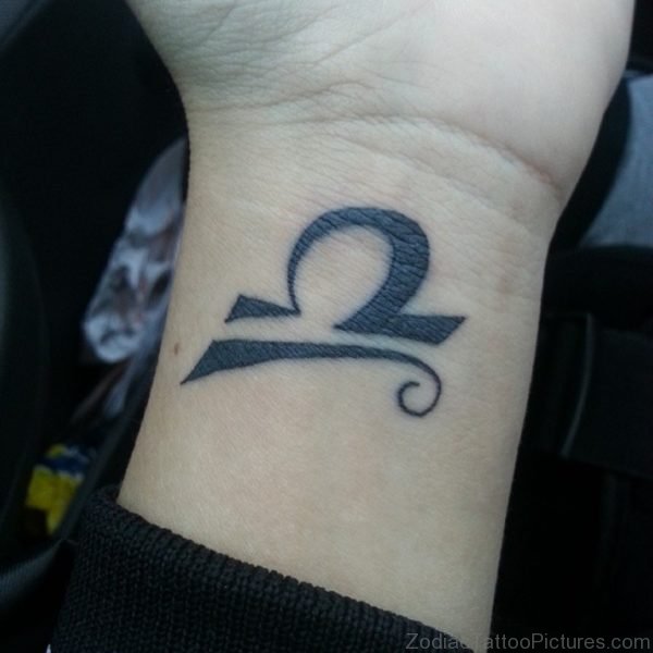 Black Ink Libra Zodiac Symbol Tattoos On Wrist