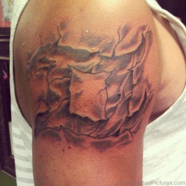 Black Ink Ripped Skin Gemini Zodiac Sign Tattoo On Right Shoulder