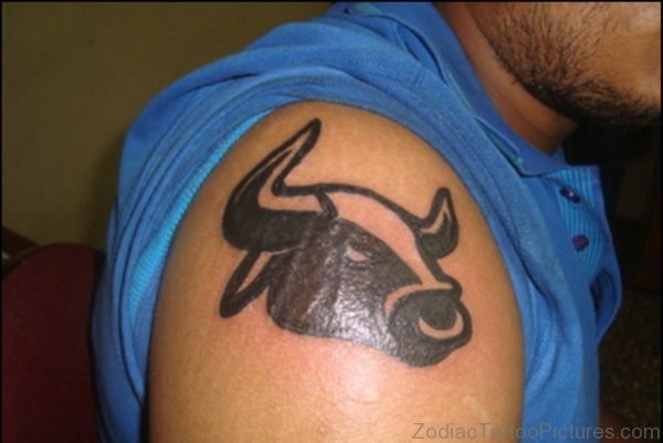 Black Ink Taurus Bull Tattoo For Shoulder Image