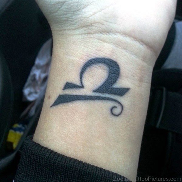 Black Libra Tattoo On Wrist 