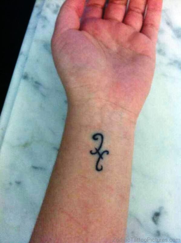 Black Pisces Symbol Tattoo On Wrist 