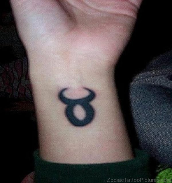Black Tribal Taurus Tattoo On Wrist