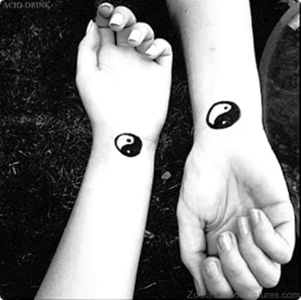 Black Yin Yang Tattoo On Couple Wrist 