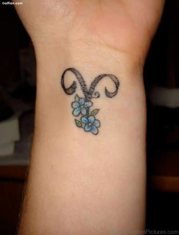 Blue Flowers and Aries Zodiac Tattoo On Wrist