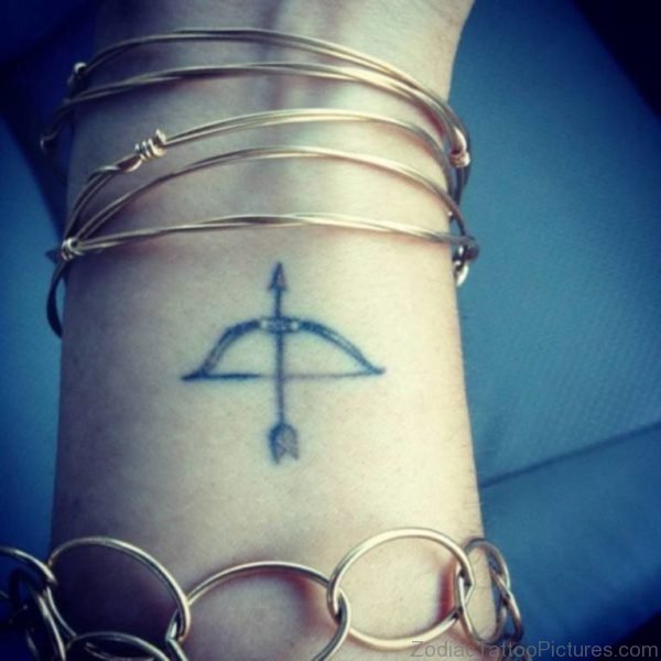 Bow And Arrow Tattoo On Wrist 