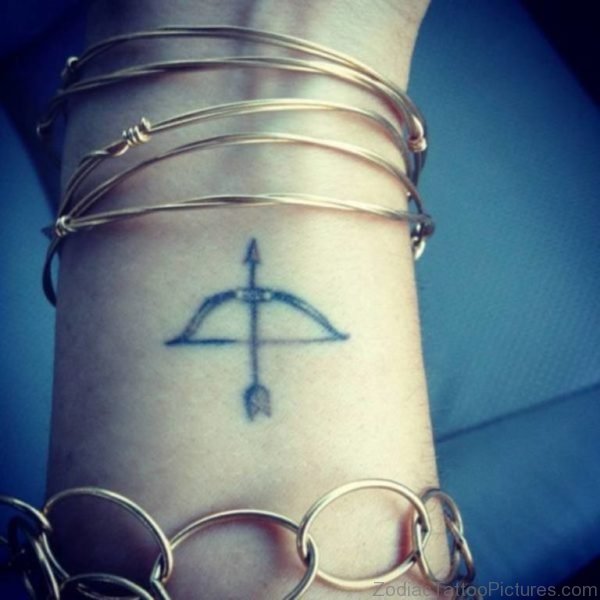 Bow And Arrow Tattoo On Wrist