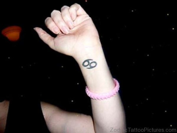 Cancer Sign Tattoo On Wrist