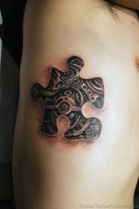 Creative Biomechanical Puzzle Tattoo On Side Rib