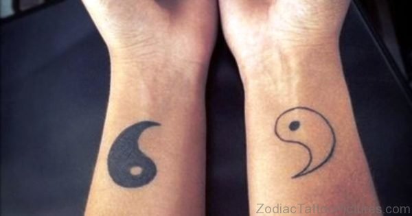 Elegant Yin Yang Tattoo On Wrist 