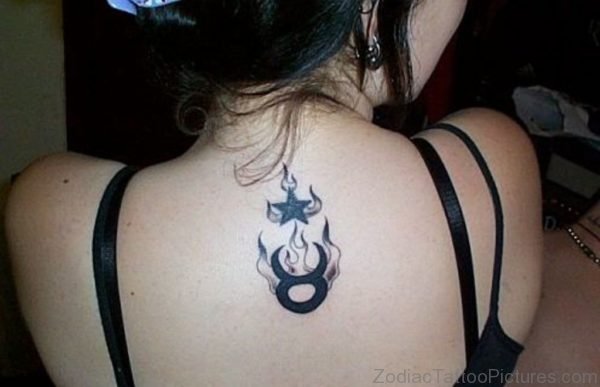 Flaming Star And Taurus Tattoo