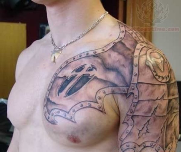 Grey Zodiac Armour Tattoo On Chest