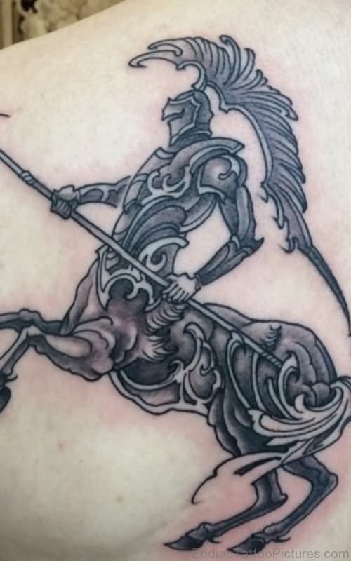 Grey Ink Sagittarius Tattoo On Man Back 