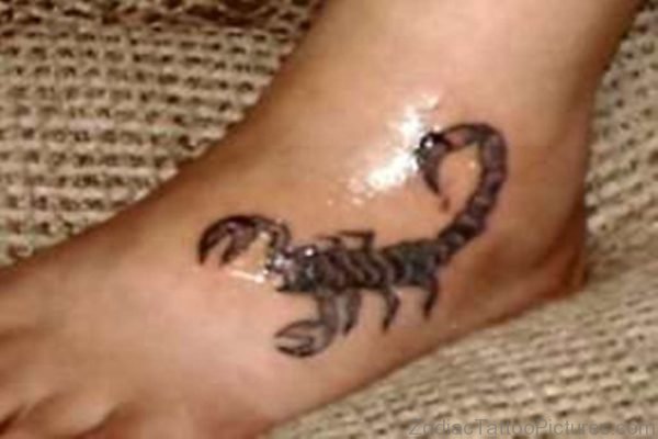 Grey Ink Scorpio Tattoo