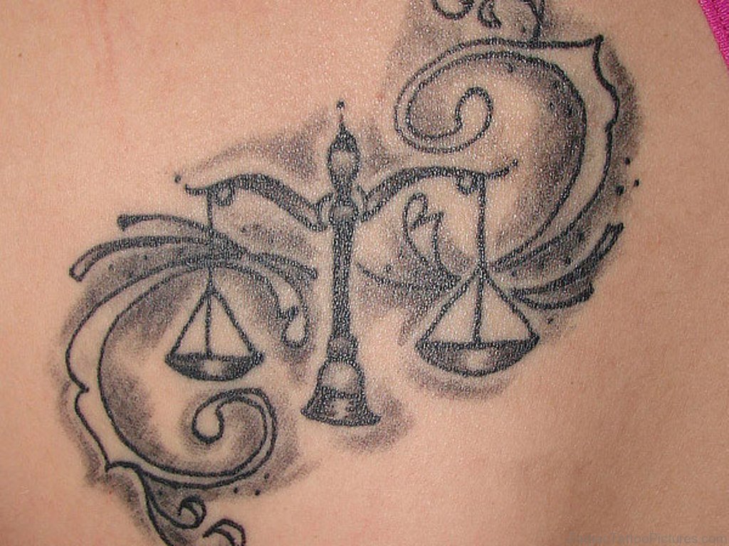 Impressive Libra Tattoo.