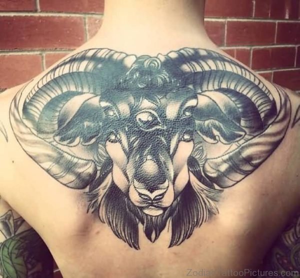 Latest 3D Aries Face Tattoo On Mans Upper Back