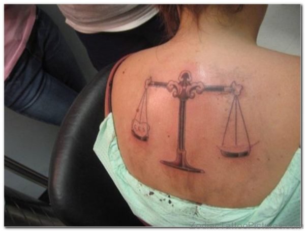Libra Scales Tattoo On Upper Back For Women