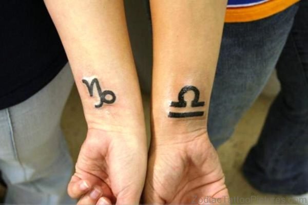 Libra Zodiac And Capricorn Tattoos On Wrist 