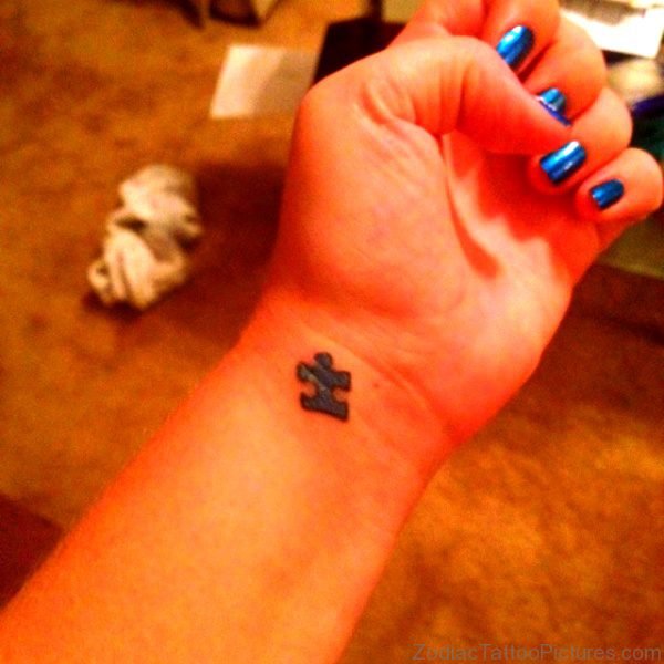 Little Autism Tattoo On Wrist