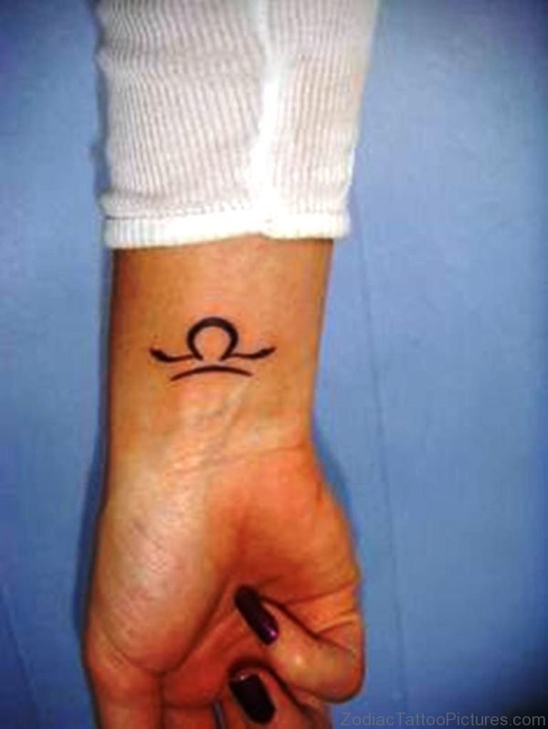 Nice Libra Tattoo On Wrist 