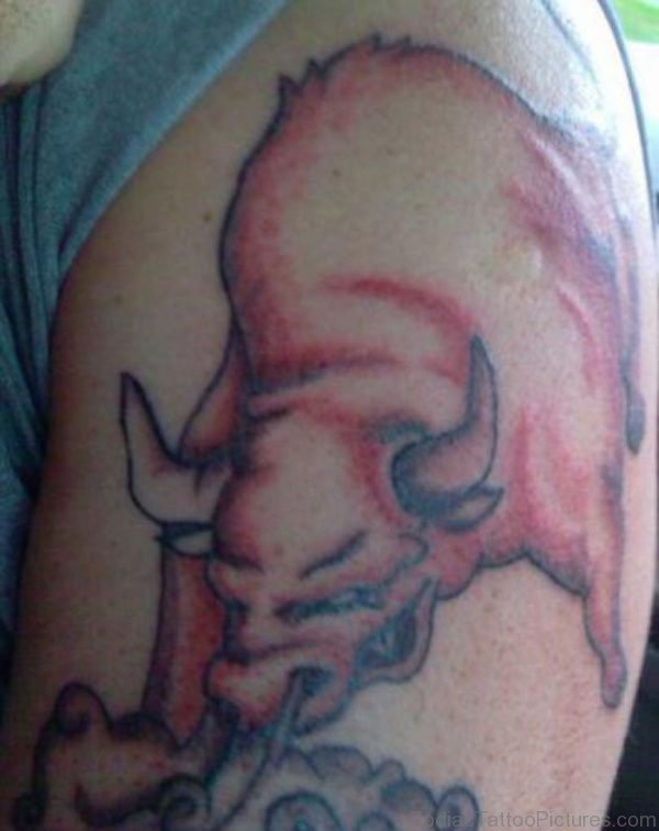 Red Colored Taurus Tattoo On Shoulder For Men