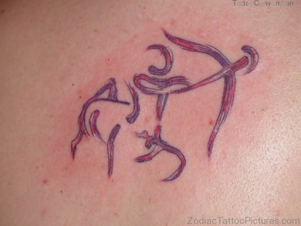 Red Ink Sagittarius Tattoo On Back 1