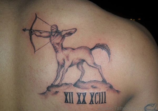 Roman Numerals And Sagittarius Tattoo On Right Back 