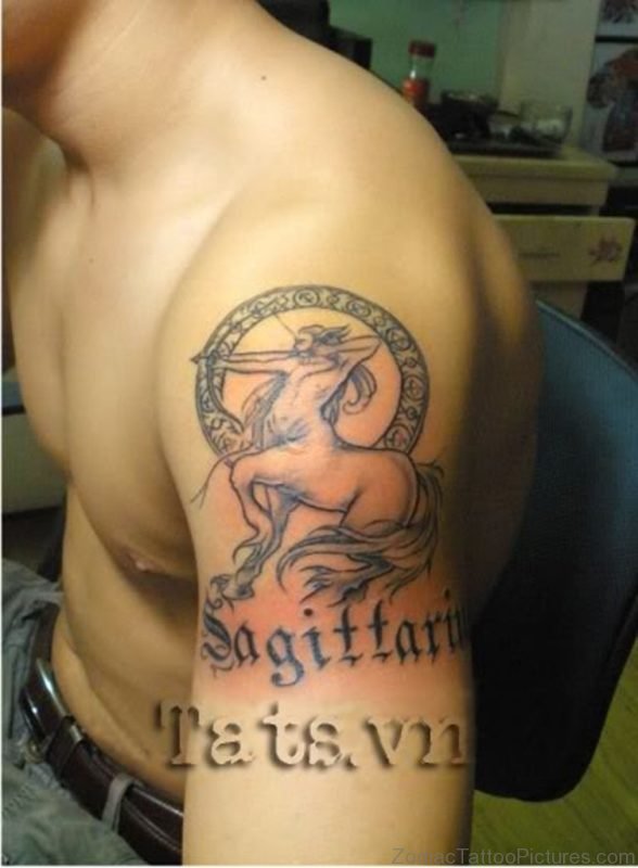 Sagittarius Grey Ink Tattoo On Man Left Shoulder 