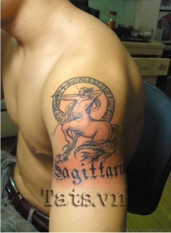 Sagittarius Grey Ink Tattoo On Man Left Shoulder