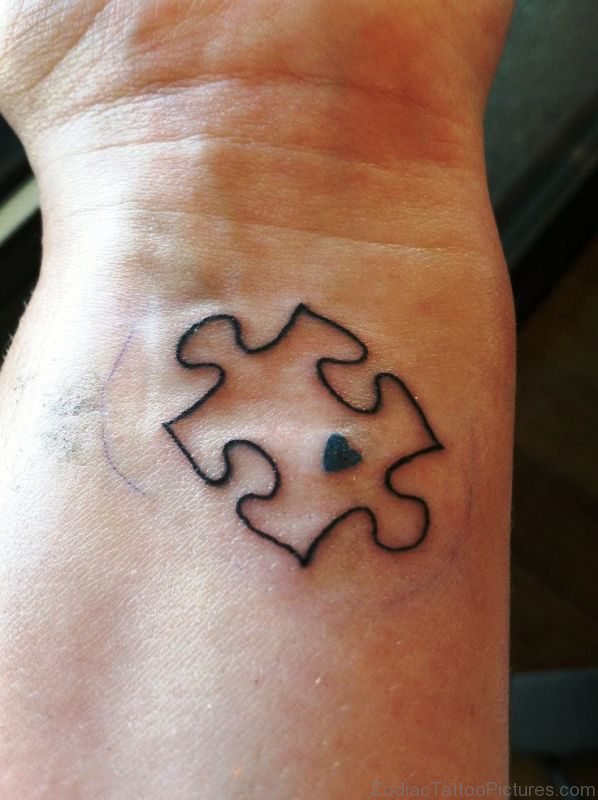 Simple Black Autism Tattoo On Wrist