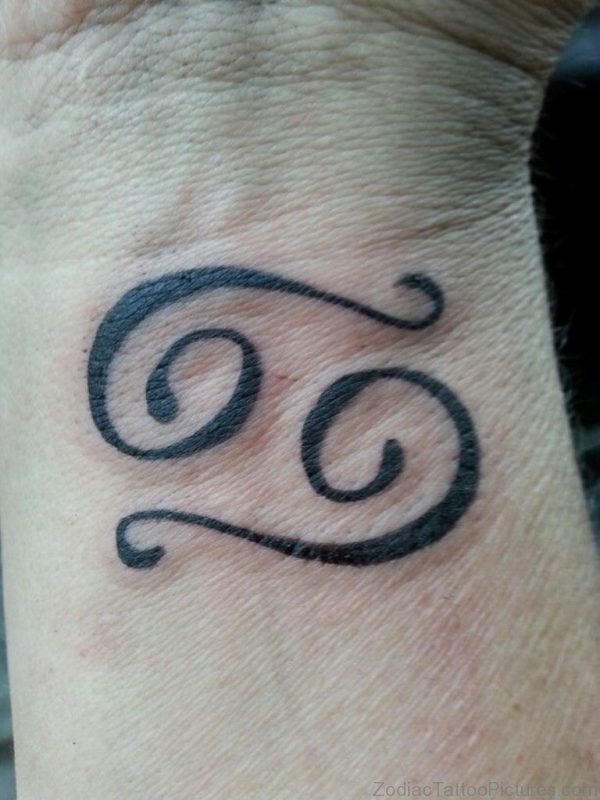 Simple Black Cancer Zodiac Sign Tattoo On Wrist