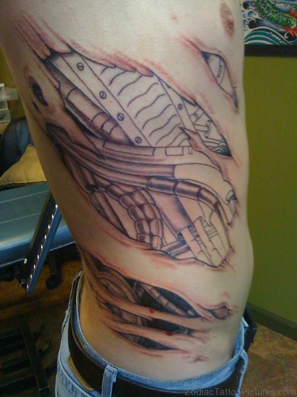 Skin Rip Biomechanical Tattoos On Rib Side