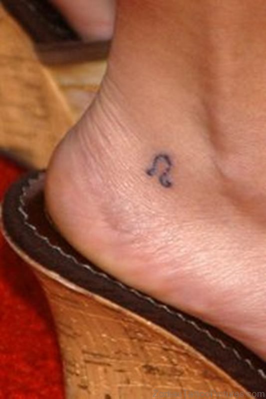 Small Leo Tattoo On Ankle