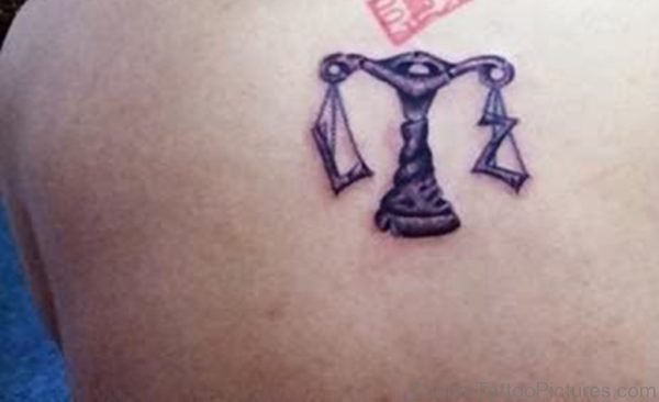 Small Libra Tattoo On Back