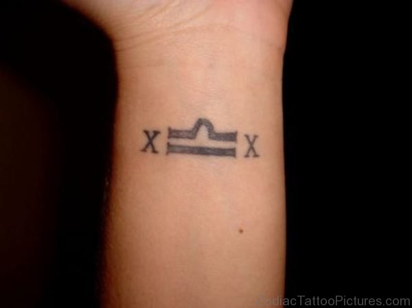 Small Libra Zodiac Tattoo On Wrist Image